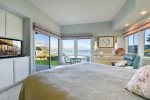 Master bedroom has a king size bed and fabulous views.